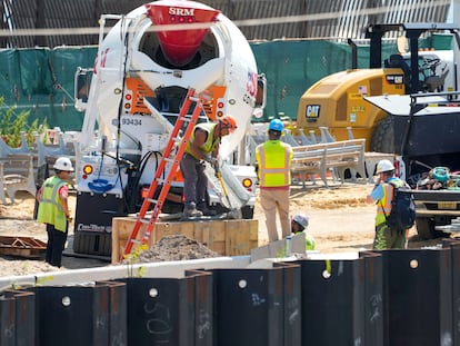 Construction workers are seen pouring concrete at the East Side Coastal Resiliency project, Thursday, July 6, 2023