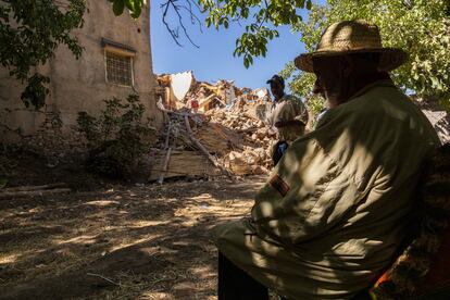 Ahmed Hait-Hamed watches the search for his daughter-in-law. 