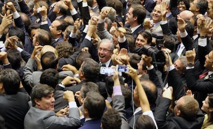 Eduardo Cunha celebrates his victory on Sunday.