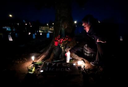 People attend a candlelight vigil for Tyre Nichols, who died after being beaten by Memphis police officers, in Memphis, Tenn., Thursday, Jan. 26, 2023.