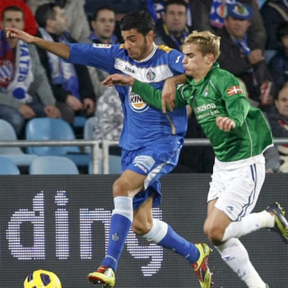 Miguel Torres y Griezmann, en el Getafe-Real Sociedad de la primera vuelta.