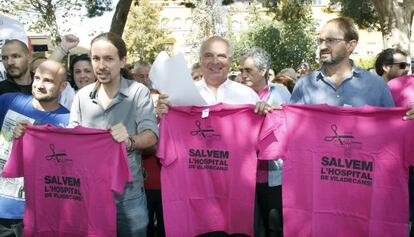 Pablo Iglesias (izquierda), Lluís Rabell (centro) y Joan Herrera (derecha).