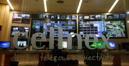 FILE PHOTO: The logo of SpainÕs telecoms infrastructures firm Cellnex is seen in a glass at the entrance of the control room of main telecom tower, known as 