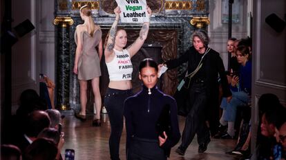 An activist from the animal rights group PETA (People for the Ethical Treatment of Animals) protests during designer Victoria Beckham's Fall-Winter 2024/2025 Women's ready-to-wear collection show at the Paris Fashion Week, in Paris, France, March 1, 2024. REUTERS/Gonzalo Fuentes