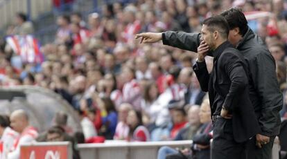 Simeone, con el Mono Burgos.