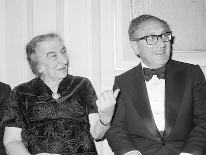 FILE - Former U.S. Secretary of State Henry Kissinger and former Israeli Prime Minister Golda Meir chat after an American Jewish Congress Dinner, Sunday night Nov. 4, 1977, in New York. Former Secretary of State Henry Kissinger, the diplomat with the thick glasses and gravelly voice who dominated foreign policy as the United States extricated itself from Vietnam and broke down barriers with China, died Wednesday, Nov. 29, 2023, his consulting firm said. He was 100. (AP Photo/Ira Schwarz, File)