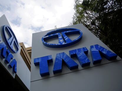 FILE PHOTO: Tata Motors logos are seen at their flagship showroom before the announcement of their Q3 results in Mumbai