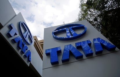 FILE PHOTO: Tata Motors logos are seen at their flagship showroom before the announcement of their Q3 results in Mumbai