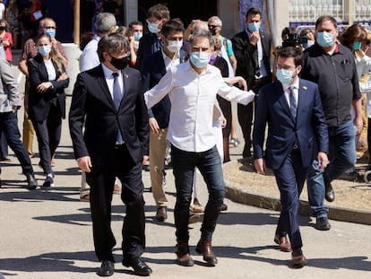 De izquierda a derecha, Carles Puigdemont, Jordi Cuixart y Pere Aragonès, esta mañana, en Elna (Francia).