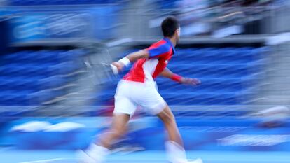 Tokyo 2020 Olympics - Tennis - Men's Singles - Bronze medal match - Ariake Tennis Park - Tokyo, Japan - July 31, 2021. Novak Djokovic of Serbia throws his racket into the stands during his bronze medal match against Pablo Carreno of Spain REUTERS/Edgar Su