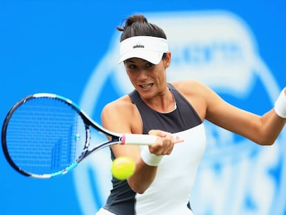 Garbi&ntilde;e Muguruza, en un torneo en junio.