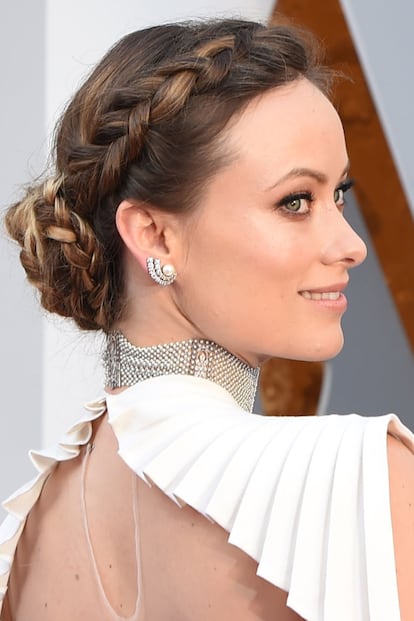 Uno de los peinados más admirados de la noche de los Óscar fue el moño trenzado de Olivia Wilde. Directo a tu Pinterest.