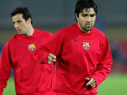 Giuly y Deco, durante el entrenamiento de ayer.