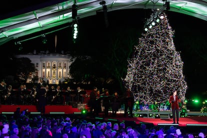 Darren Criss performs during the lighting of the National Christmas Tree, near the White House