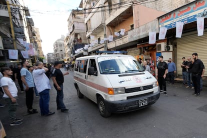 An ambulance believed to be carrying wounded people on Wednesday, after multiple explosions were heard during the funeral of four Hezbollah fighters killed on Monday.