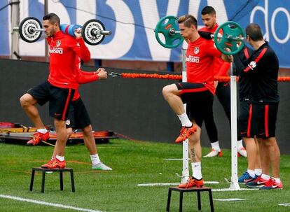 Torres y Koke, durante el entreniento del Atlético.