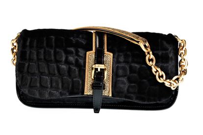 Cartera de terciopelo de Longchamp (680 euros).