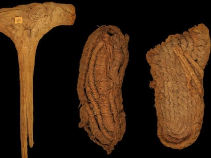 Three of the objects recovered from the Bat Cave: on the left, a mallet made of olive wood, along with two esparto sandals.