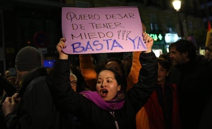 A protestor with a sign reading: “I wnat to stop being afraid! Enough is enough.”