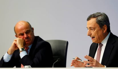 Mario Draghi y Luis de Guindos