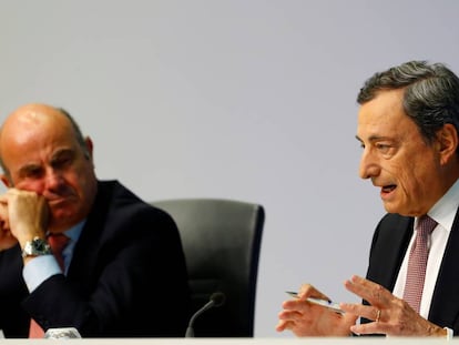 Mario Draghi y Luis de Guindos