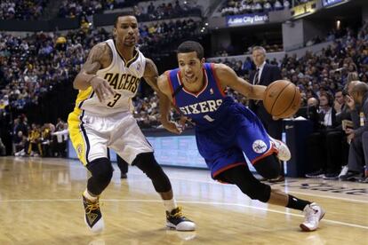 Michael Carter-Williams y George Hill.