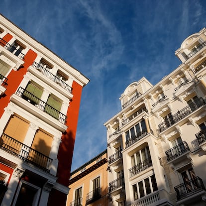 "Colorful facades of buildings in Madrid, Spain at sunset light"