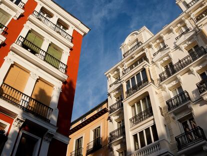"Colorful facades of buildings in Madrid, Spain at sunset light"