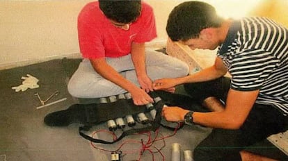 Youssef Aalla and Younes Abouyaaqoub fitting a vest with explosives.