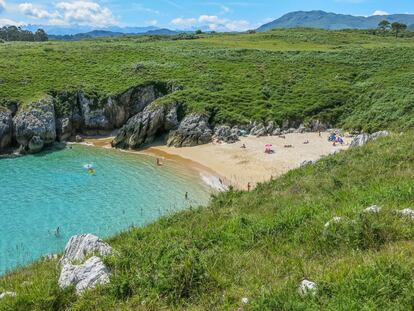 San Antonio, Llanes in Asturias. This tranquil cove can only be reached at low tide and by foot.The beach is protected from the waves and surrounded by lush green forestry. To get to San Antonio, visitors must follow a 700-meter long path down to the sea. Visitors can wait for a good moment to cross at the San Antonio hermitage.