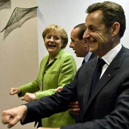 Merkel, Berlusconi y Sarkozy, tres asiduos de la nieve suiza.