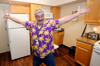 Thomas Marshall shows off the kitchen in his one bedroom apartment, which he got as part of the new housing program, in Sacramento, California, on February 24, 2023.