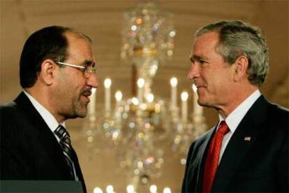 El primer ministro de Irak, Nuri al Maliki (izquierda), y el presidente de EE UU, George W. Bush, al término de su rueda de prensa en Washington.