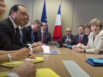 Alexis Tsipras, Angela Merkel y  Francois Hollande en la reuni&oacute;n mantenida este viernes.