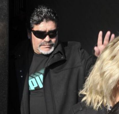 Maradona at his father's funeral.