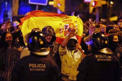 Members of far-right groups do the fascist salute at a counter-protest in Plaza Artós square in Barcelona.