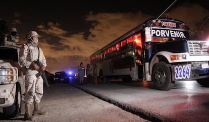 A soldier on the site where nine people were killed in a Ciudad Ju&aacute;rez mechanic&#039;s garage in September. 