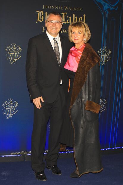 Michael Robinson y su esposa Christine, en una fiesta en febrero de 2012.