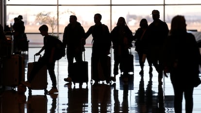 People pass through Salt Lake City International Airport Wednesday, Jan. 11, 2023