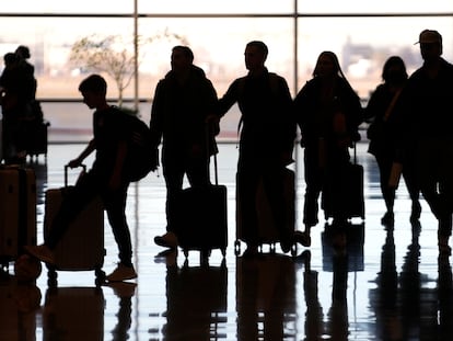 People pass through Salt Lake City International Airport Wednesday, Jan. 11, 2023, in Salt Lake City. Feb. 13, 2024.