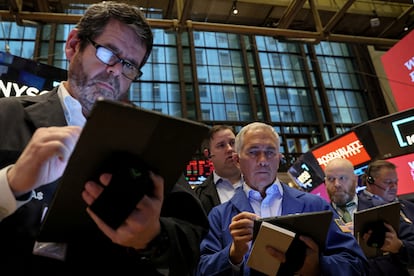 Traders work on the floor of the New York Stock Exchange (NYSE) in New York City, February 17, 2023.