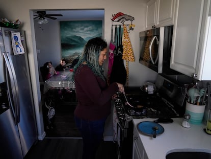 Betty Rivas prepares breakfast for her family Thursday, February 23, 2023, in Commerce City, Colorado.