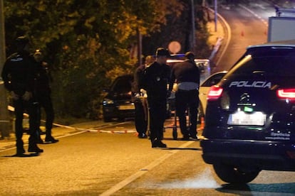 Police taking away the body of a man shot in Cabopino (Marbella).