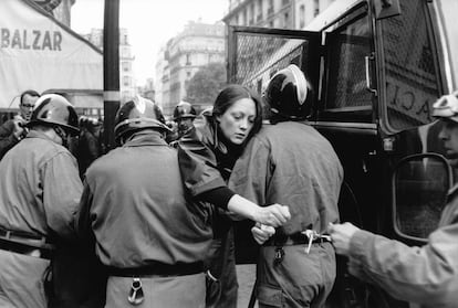 A protester arrested during the May 1968 riots in Paris