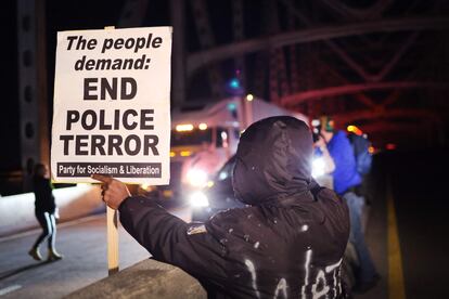  Several demonstrators block traffic in Memphis, Tennessee, on Friday, January 27, 2023.