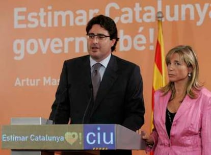 David Madí, en un acto de CiU, con Joana Ortega.