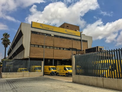 Mail delivery vans parked in post office hub