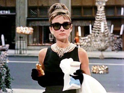 Audrey Hepburn, in front of Tiffany's jewelry store in the opening sequence of 'Breakfast at Tiffany's'.