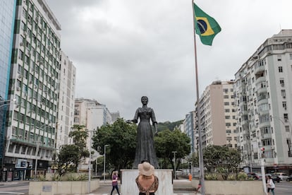 A tourist photographs the statue of Princess Isabel located in the Copacabana neighborhood of the city of Rio de Janeiro (Brazil).