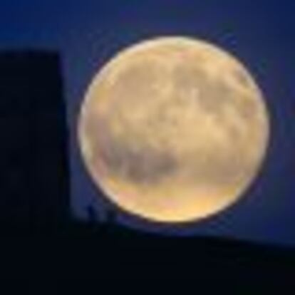 Blue Moon Rises Over Glastonbury Tor